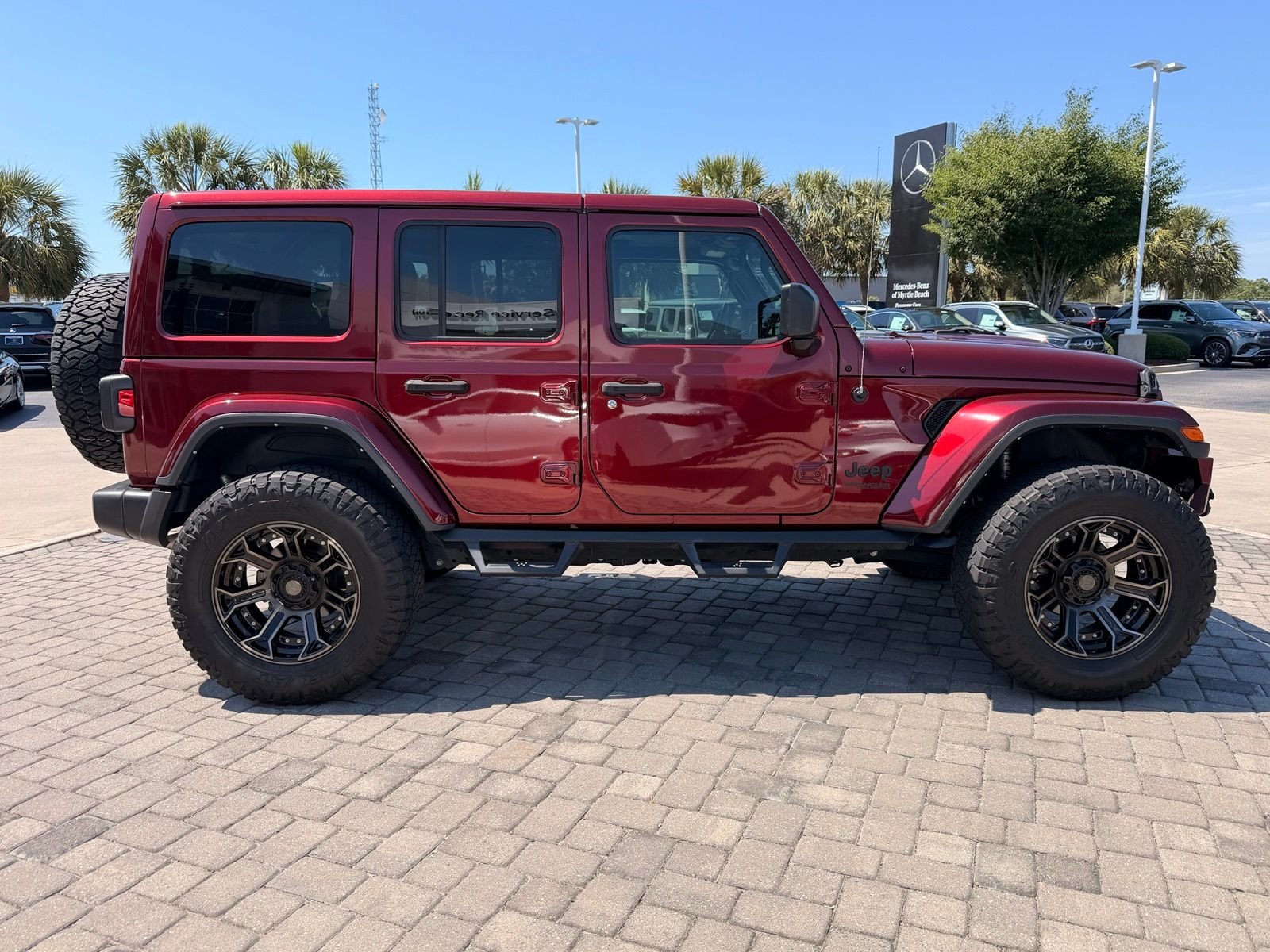 Used 2022 Snazzberry Pearlcoat Jeep Unlimited Sahara image 8