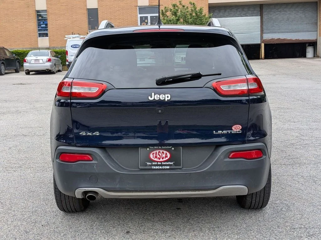 Used 2016 Blue Jeep Limited image 4