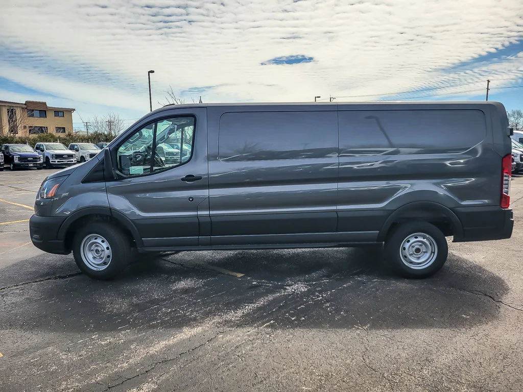 New 2026 Carbonized Gray Metallic Ford Cargo Van image 1