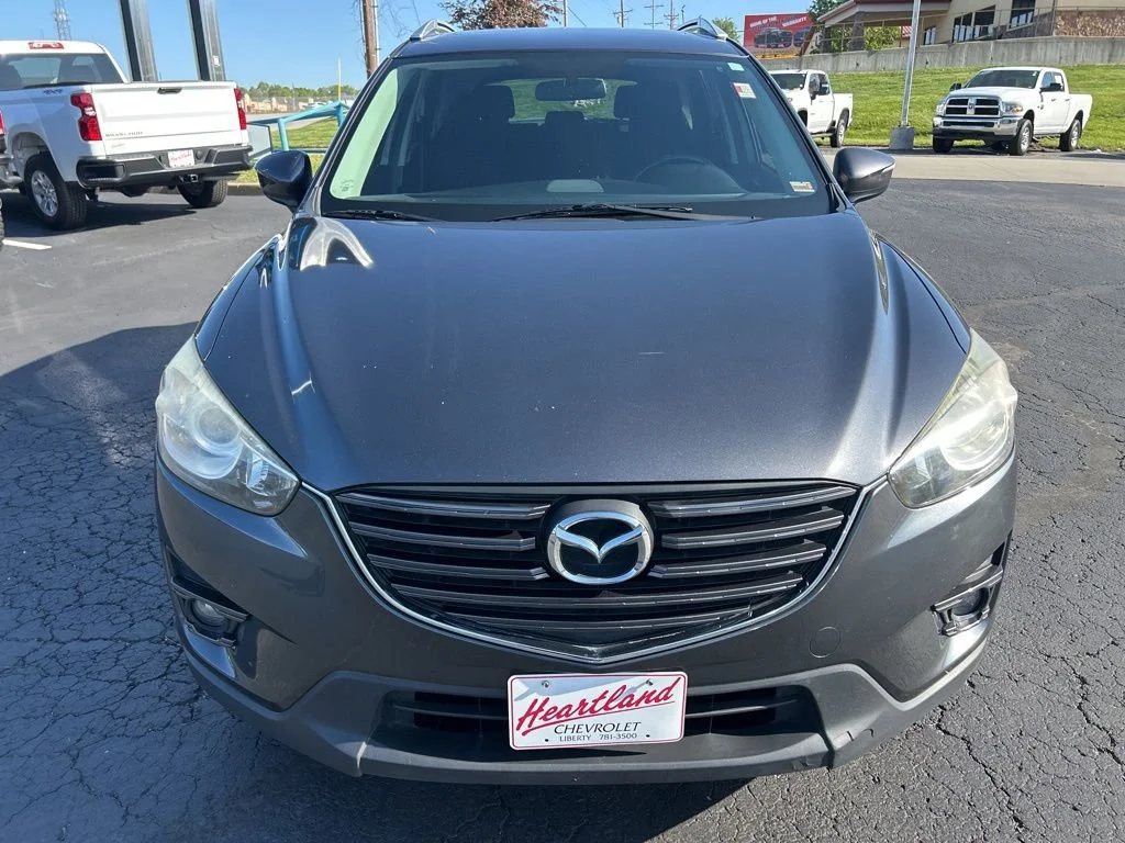 Used 2016 Mazda CX-5 Touring with VIN JM3KE4CY0G0640116 for sale in Kansas City