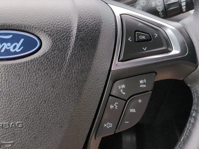 Certified Used 2024 Star White Ford Titanium image 27