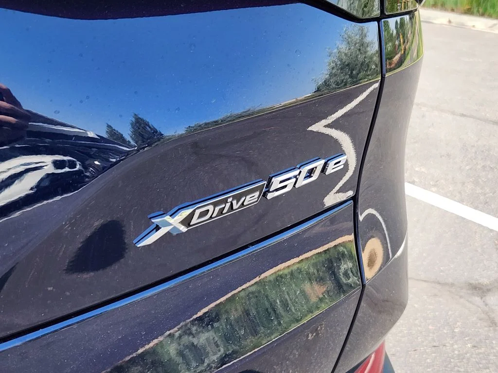 New 2026 Tanzanite Blue II Metallic BMW xDrive50e image 20