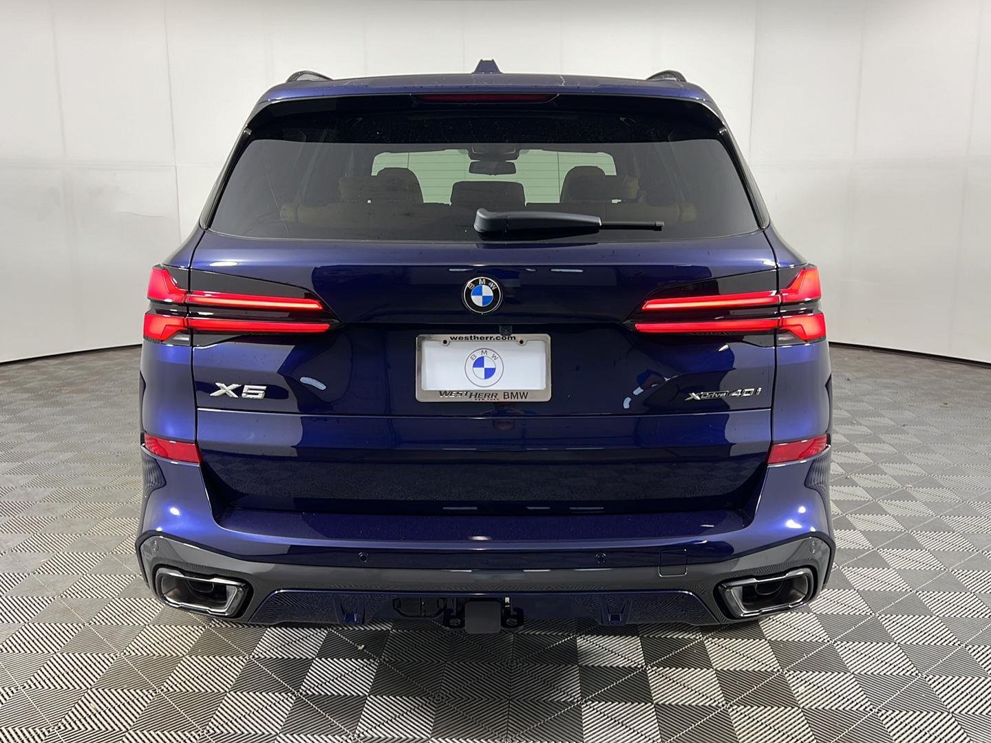 New 2026 Tanzanite Blue II Metallic BMW xDrive40i image 16