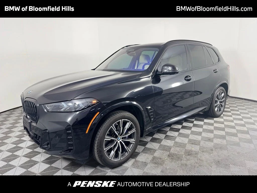 Certified Used 2026 Black Sapphire Metallic BMW xDrive40i image 1