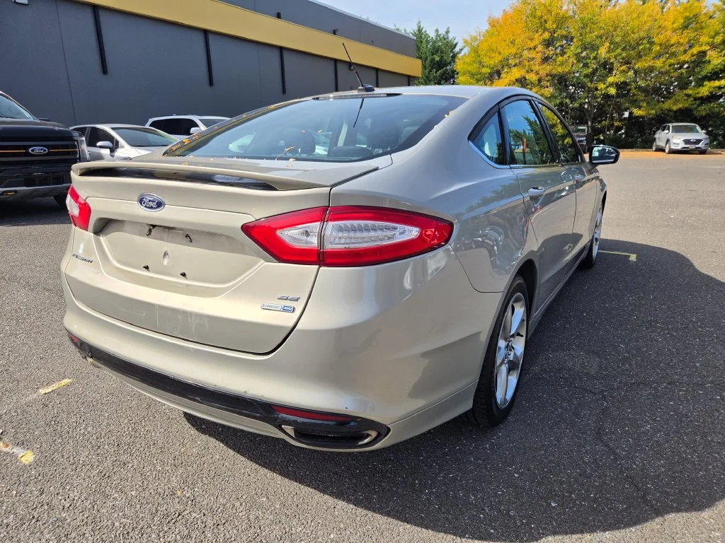Used 2015 Gold Ford SE image 7