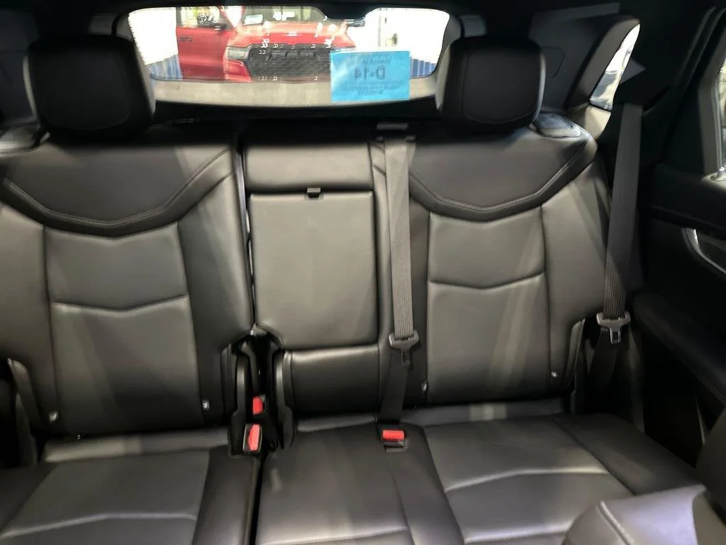 Used 2023 Stellar Black Metallic Cadillac AWD Sport image 25
