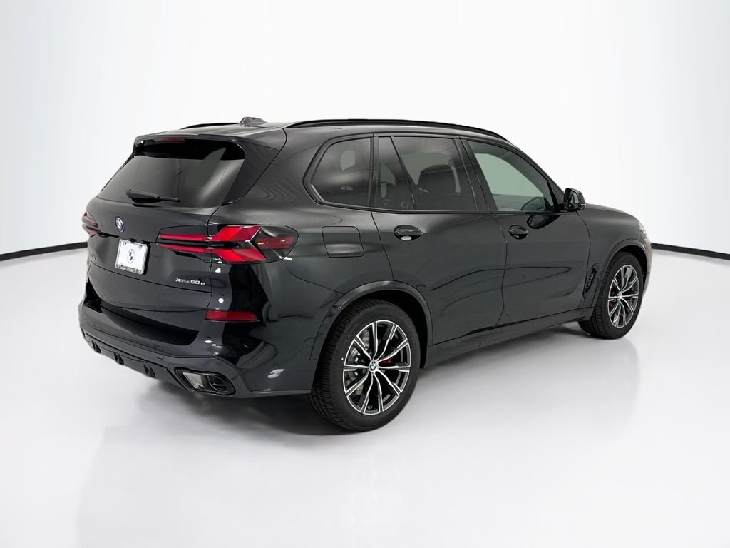 New 2026 Black Sapphire Metallic BMW xDrive50e image 5