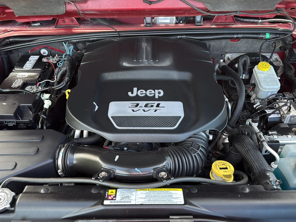 Used 2012 Red Jeep Unlimited Sahara image 29