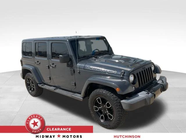 Used 2017 Black Jeep Unlimited Sahara image 1