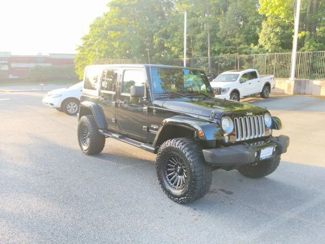 Used 2018 Black Jeep Unlimited Sahara image 8