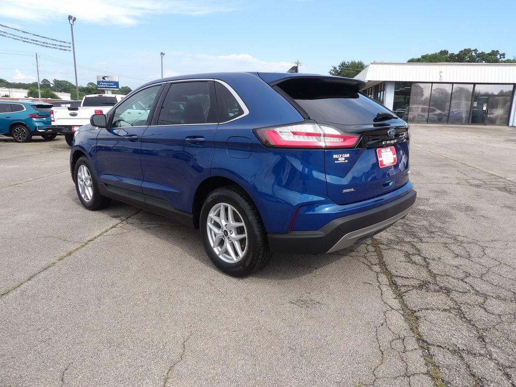 Used 2024 Blue Metallic Ford SEL image 6