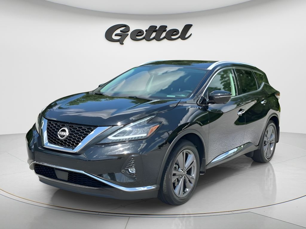 Used 2024 Black Nissan Platinum image 1