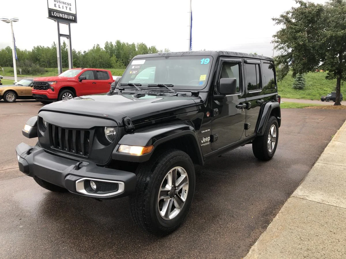 Used 2019 Black Jeep Unlimited Sahara 4x4 image 4
