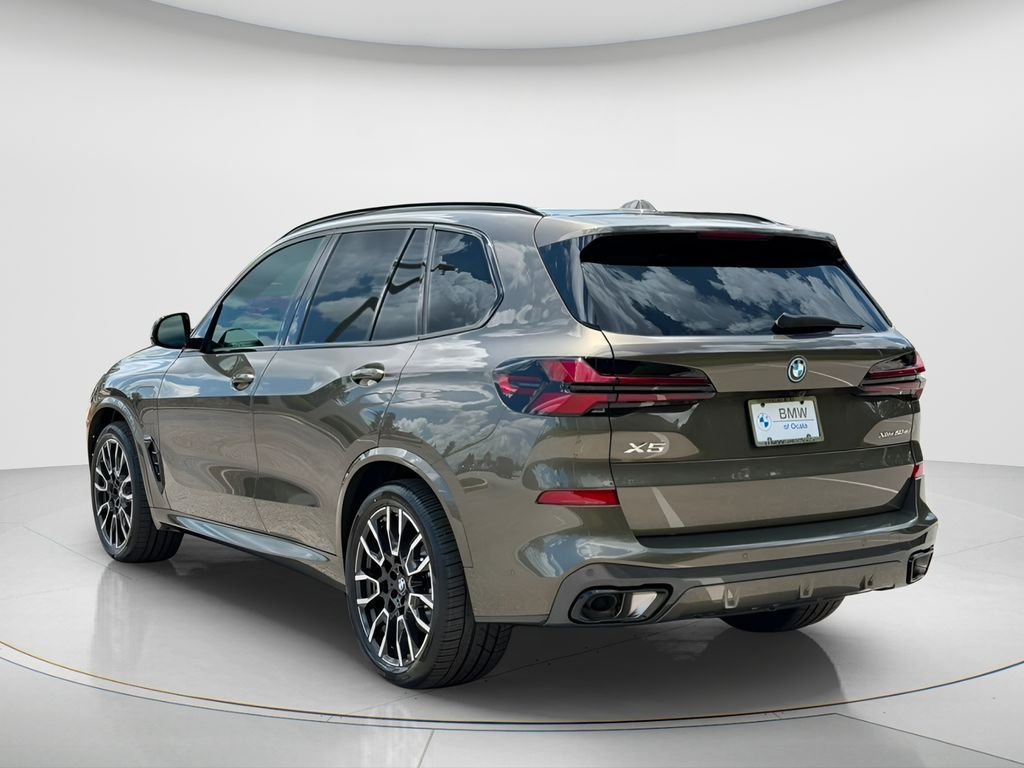 New 2026 Manhattan Green Metallic BMW xDrive50e image 4