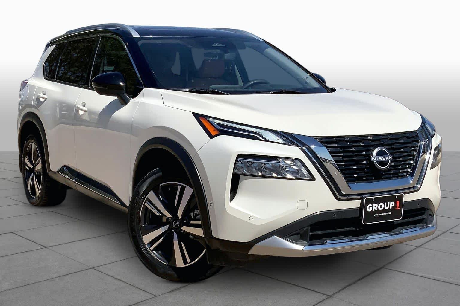 Used 2023 Pearl White Tricoat/Super Black Nissan Platinum image 3