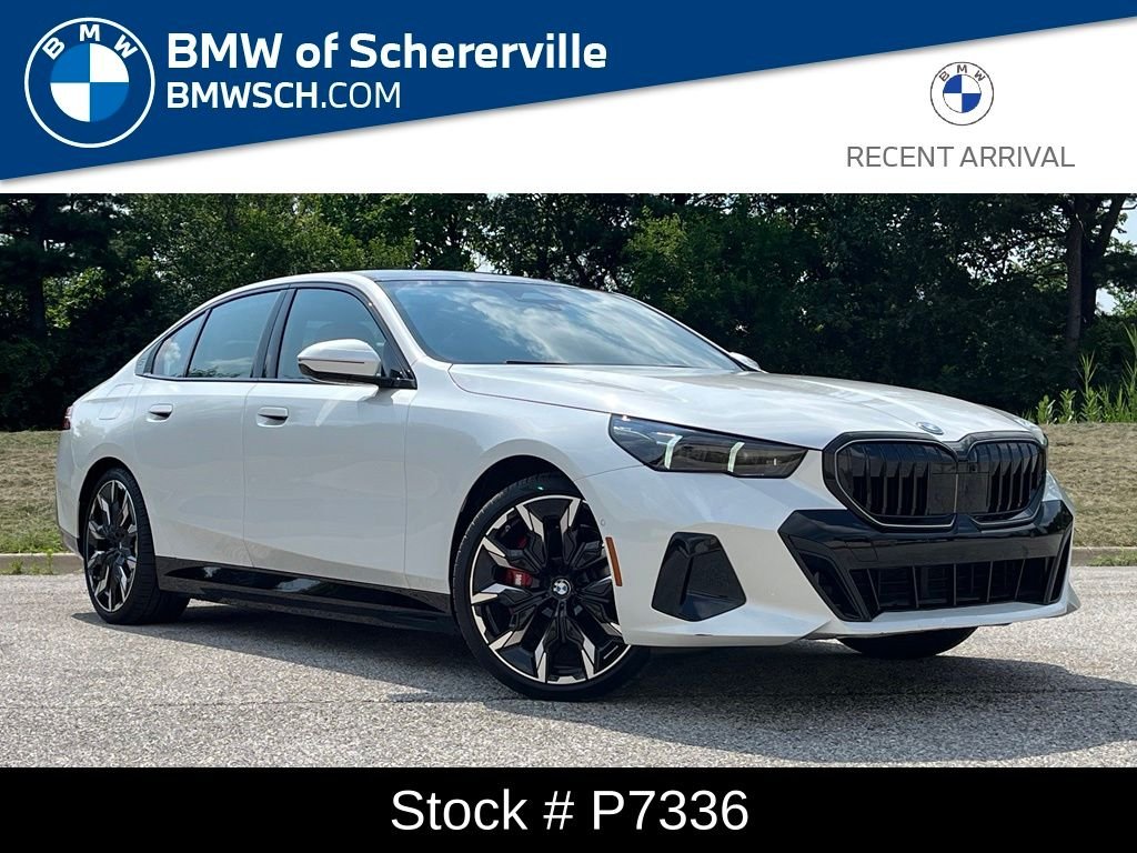 Used 2026 Mineral White Metallic BMW 550e xDrive image 1