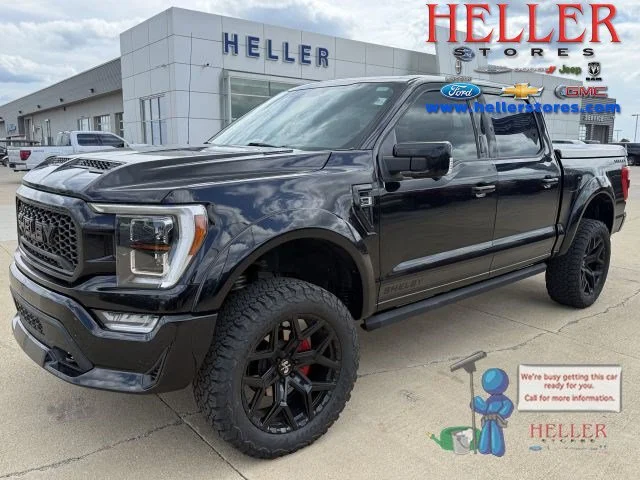Used 2021 Black Metallic Ford Lariat image 1