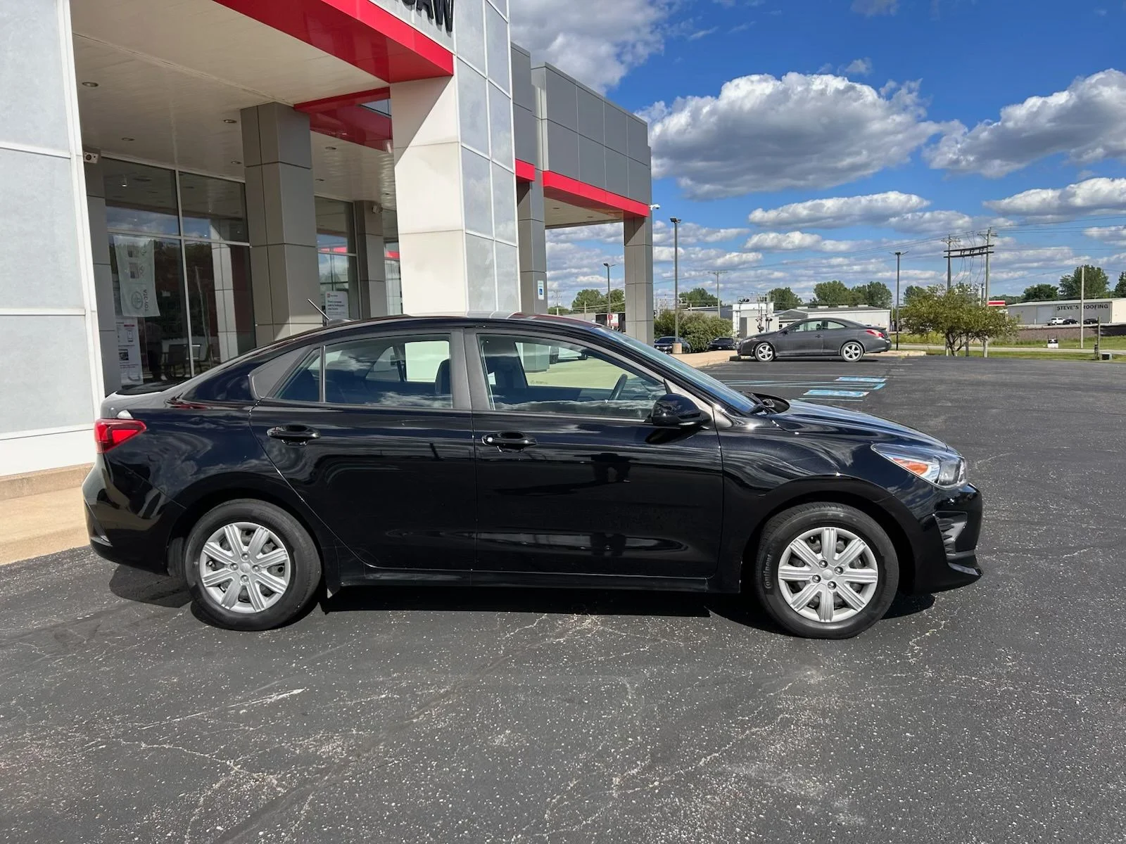 Used 2022 Black Kia LX image 2