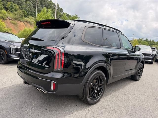 Used 2024 Black Kia EX X-Line image 14