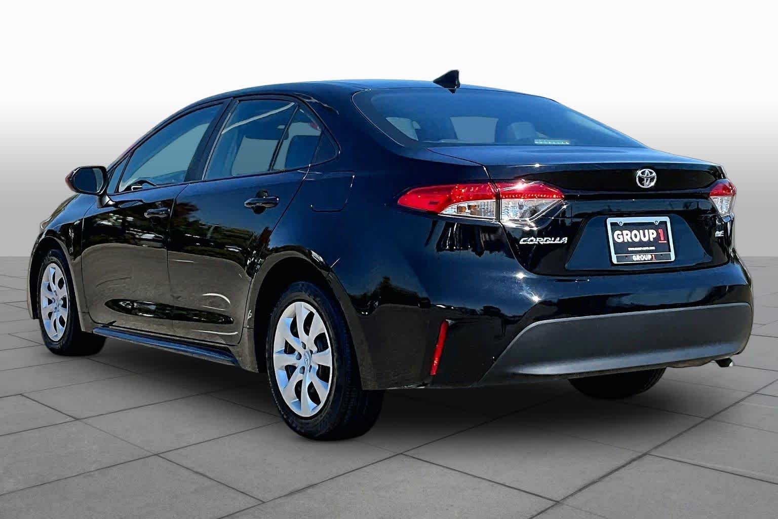 Used 2023 Midnight Black Metallic Toyota LE image 11