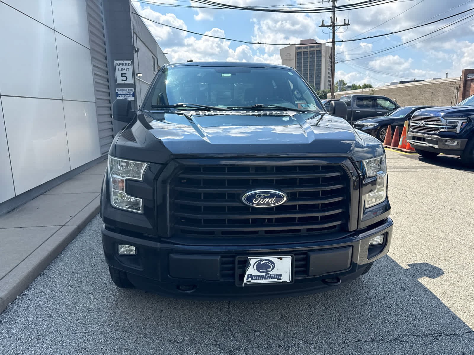 Used 2016 Shadow Black Ford XLT 4WD SuperCrew 145 image 2