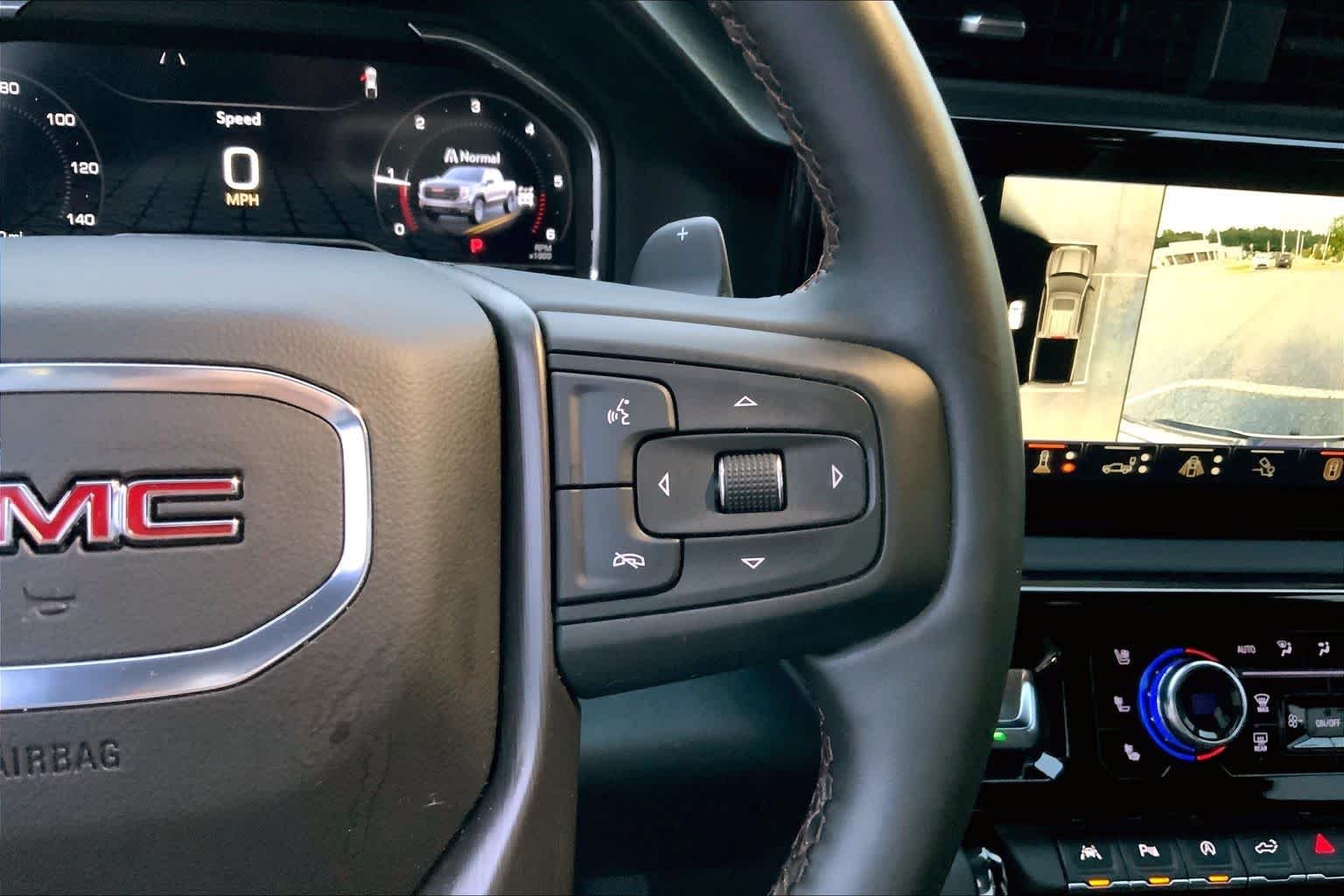 Used 2025 Summit White GMC AT4 image 24