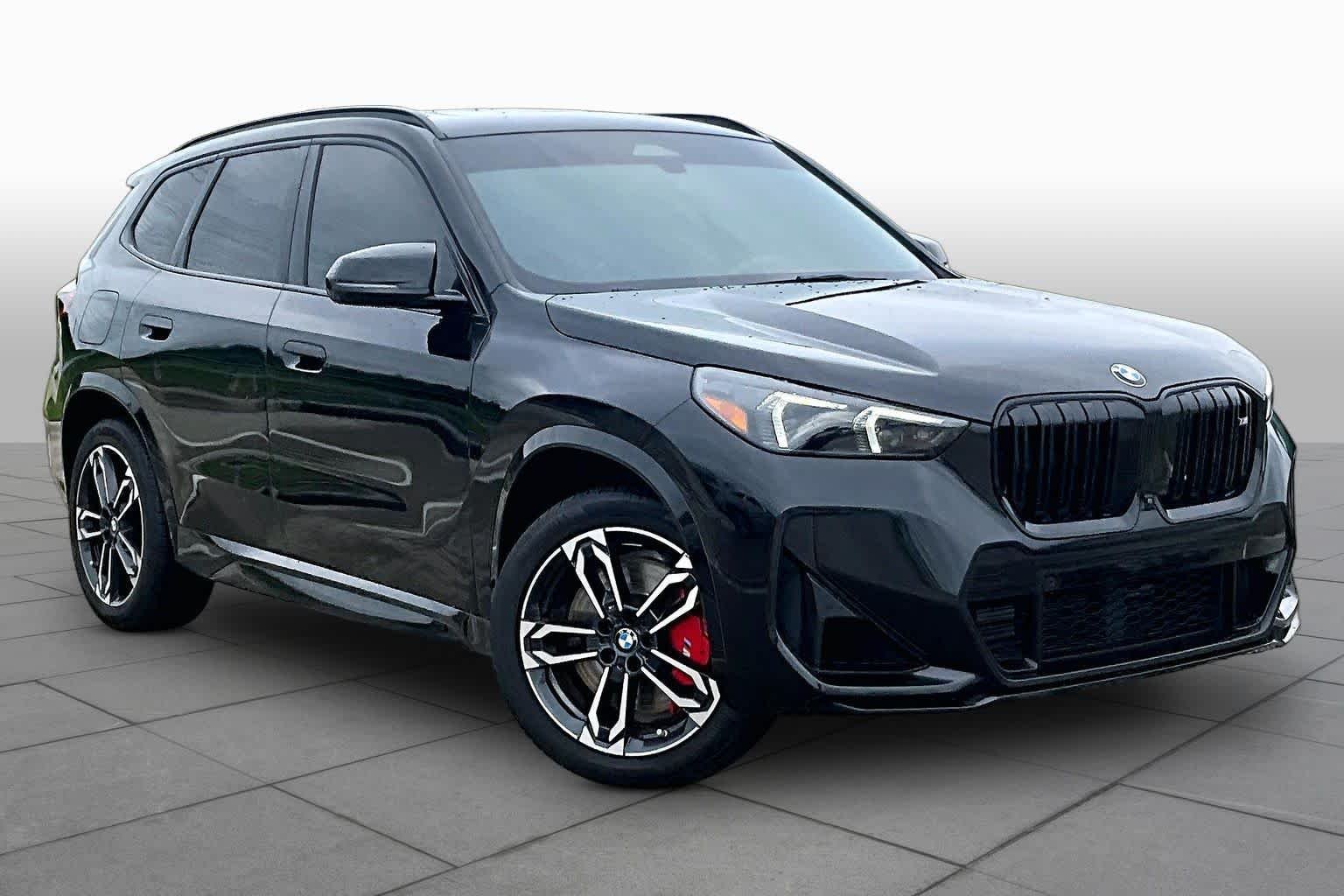 Used 2024 Black Sapphire Metallic BMW M35i image 2