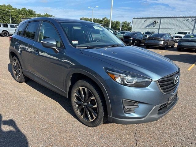 Used 2016 Blue Reflex Mica Mazda Grand Touring image 1