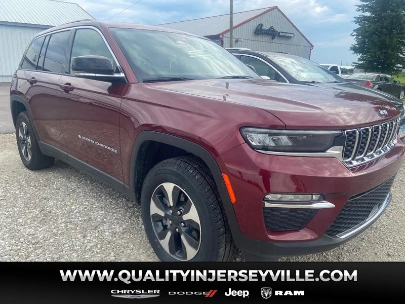 Used 2024 Velvet Red Pearlcoat Jeep 4xe image 1