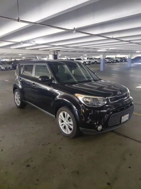 Used 2016 Black Kia Plus image 1