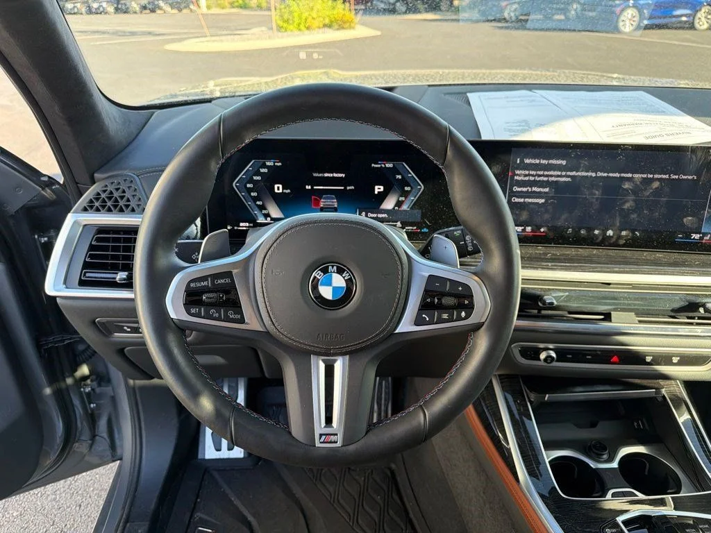 Used 2025 Skyscraper Grey Metallic BMW M60i image 13