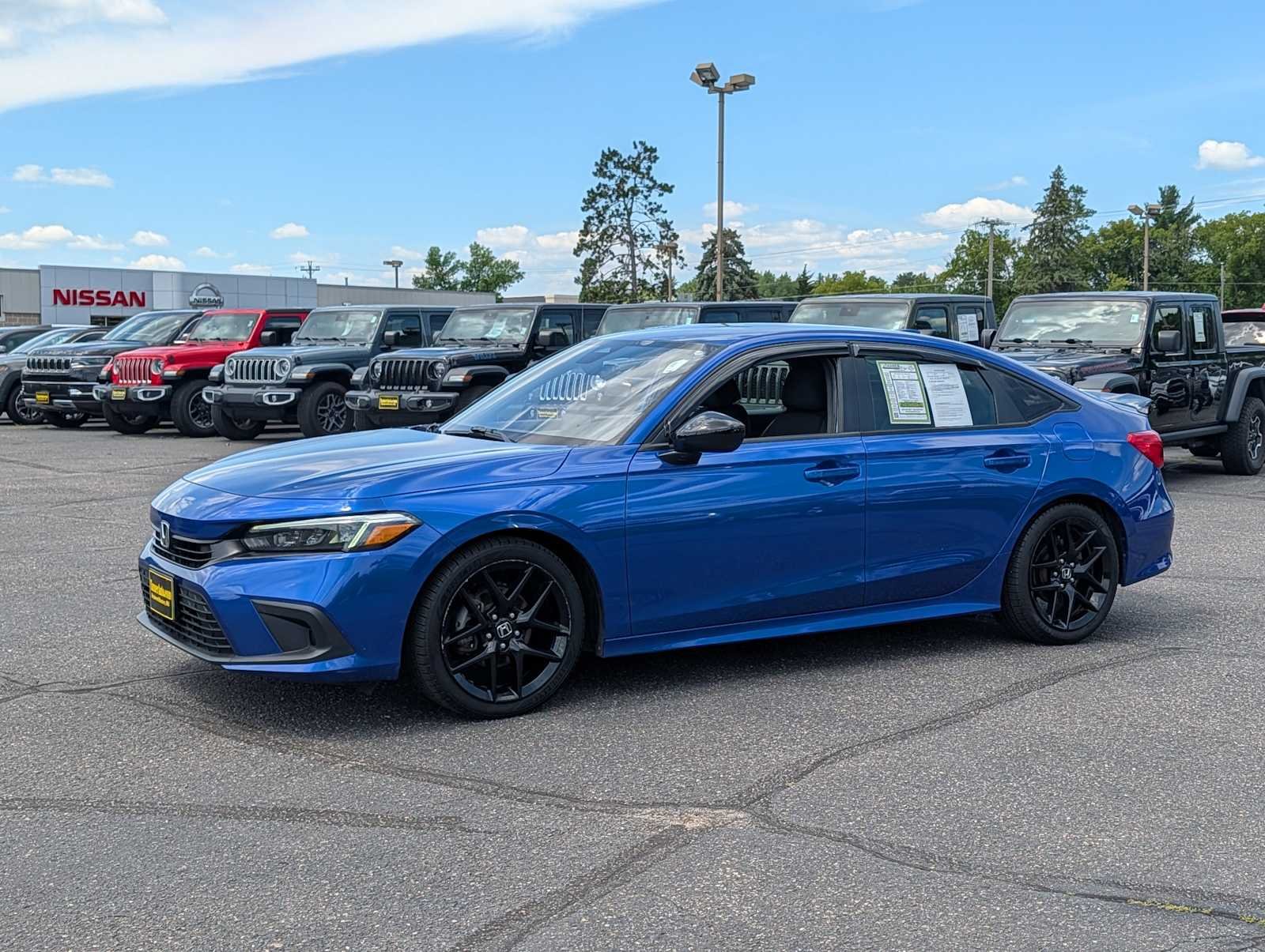 Used 2023 Honda Civic Sport with VIN 2HGFE2F5XPH570797 for sale in Brainerd, Minnesota