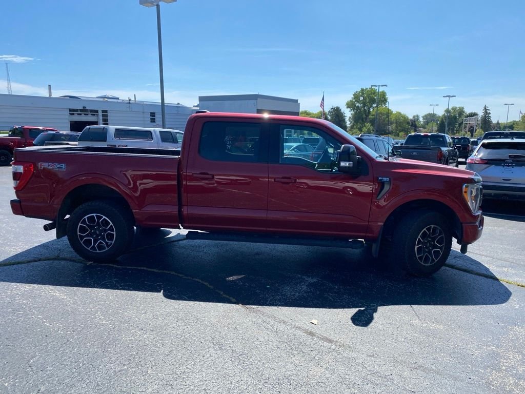 Used 2023 Rapid Red Metallic Tinted Clearcoat Ford Lariat image 3