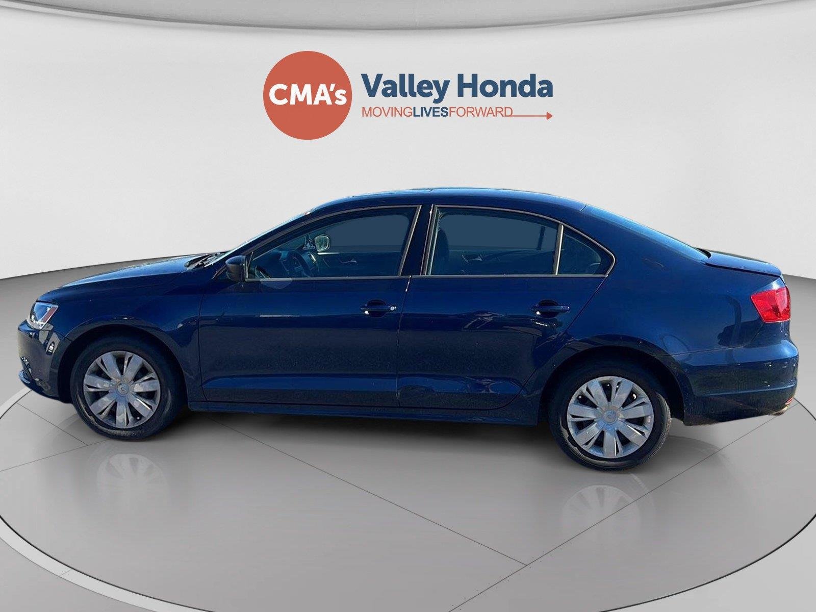 Used 2012 Tempest Blue Metallic Volkswagen S w/Sunroof image 2