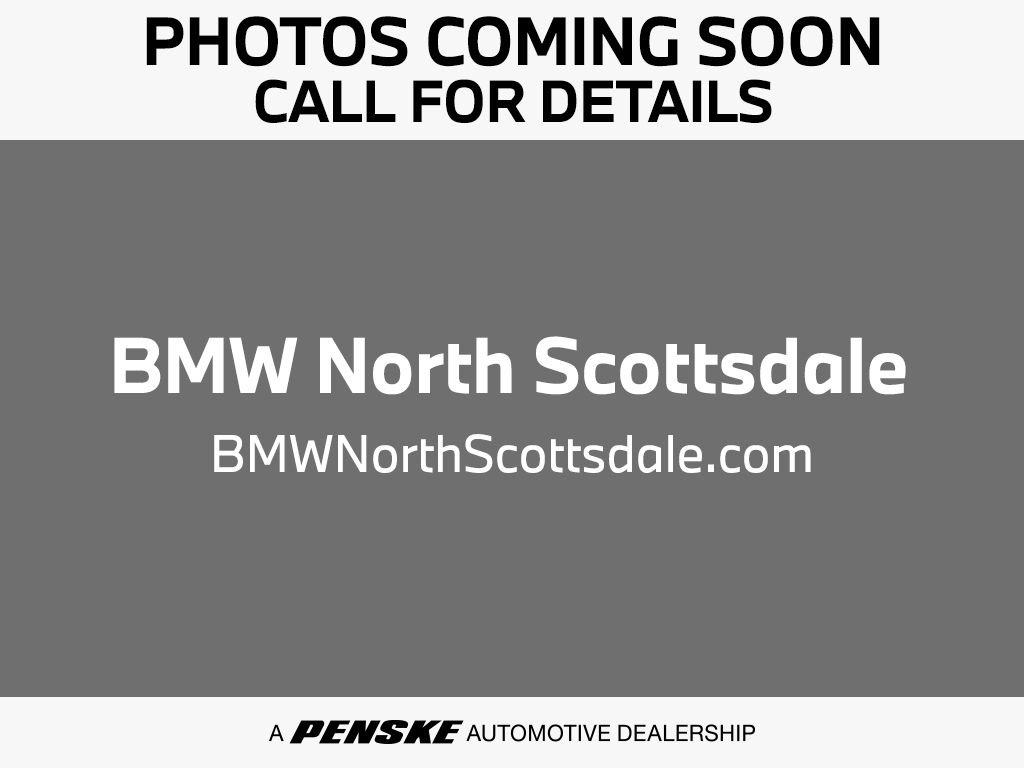 Certified Used 2023 Blue Metallic BMW sDrive40i image 1