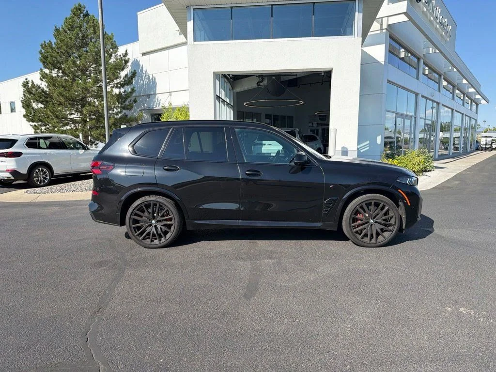 Used 2025 Black Sapphire Metallic BMW M60i image 6