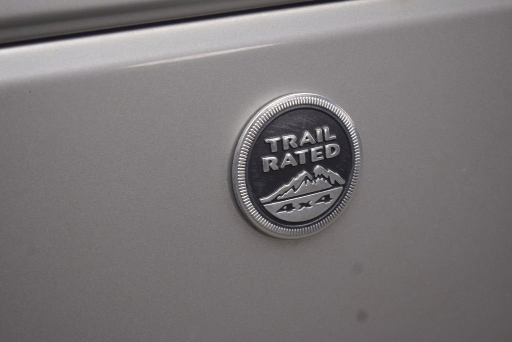 Used 2012 Bright Silver Metallic Clearcoat Jeep Sport image 29