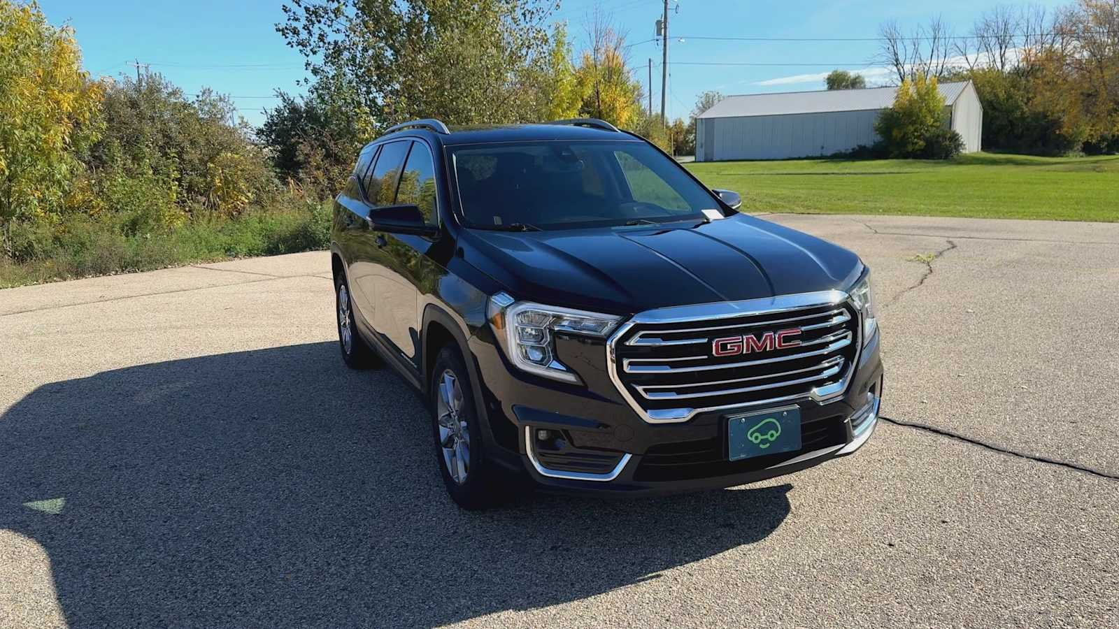 Certified Used 2024 Ebony Twilight Metallic GMC SLT image 3