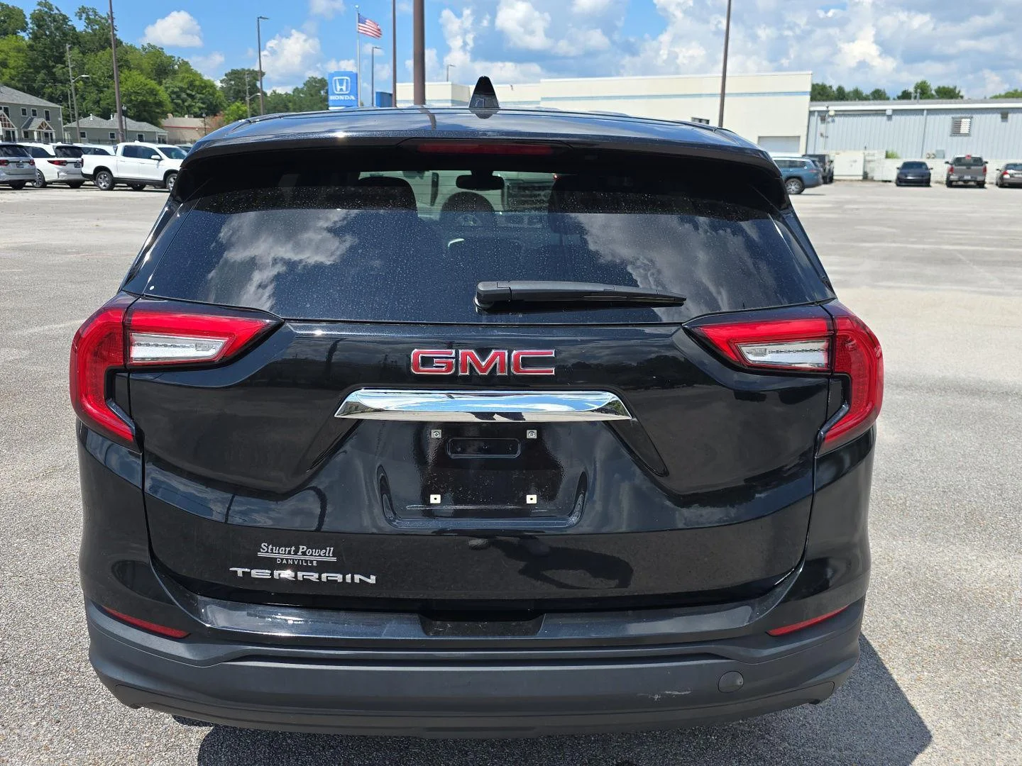 Used 2024 Ebony Twilight Metallic GMC SLE image 4