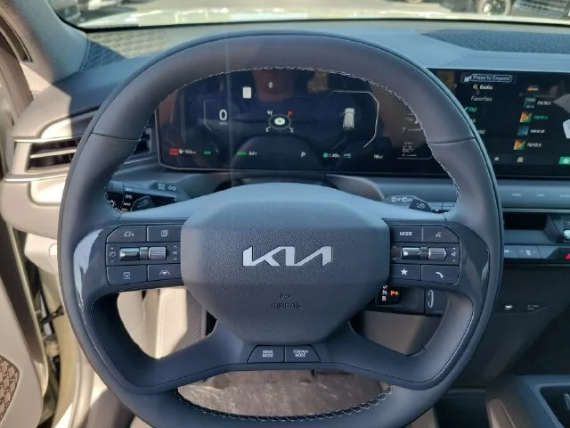 New 2026 Ivory Silver Kia Wind AWD image 17