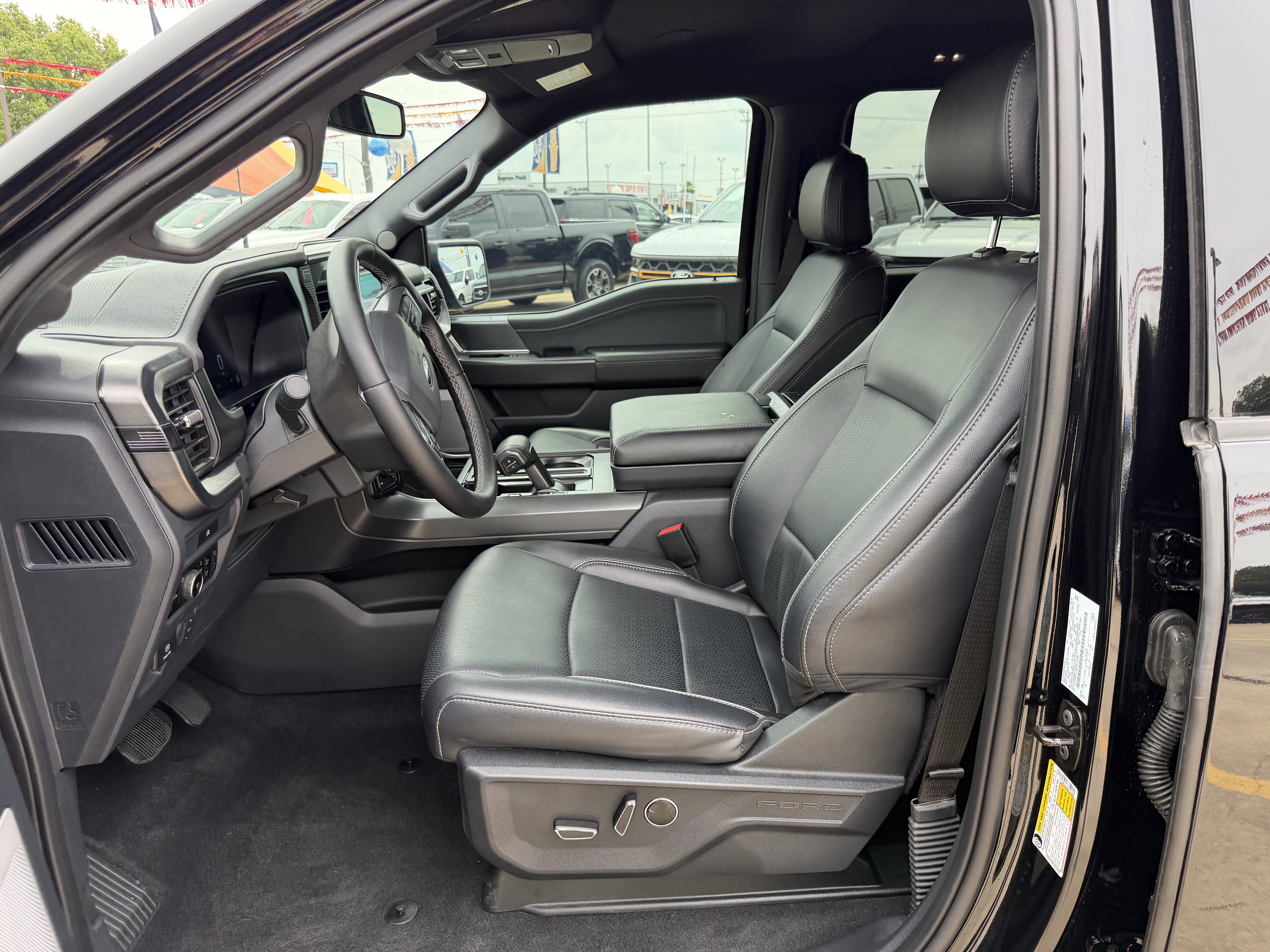 Used 2025 Agate Black Metallic Ford Lariat image 16