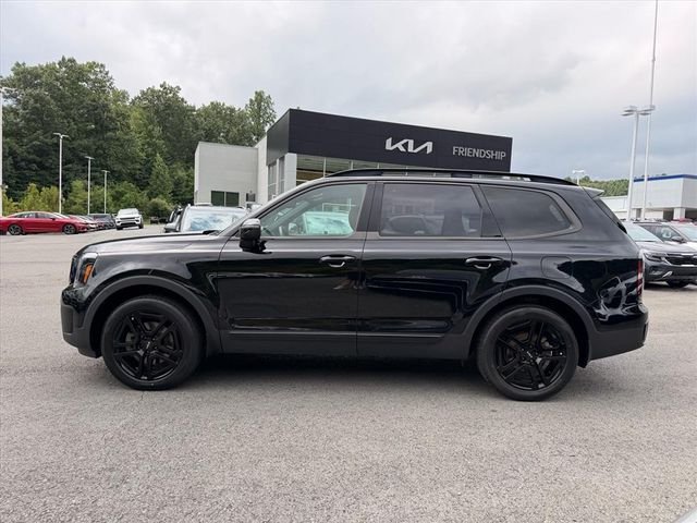Used 2024 Black Kia EX X-Line image 4