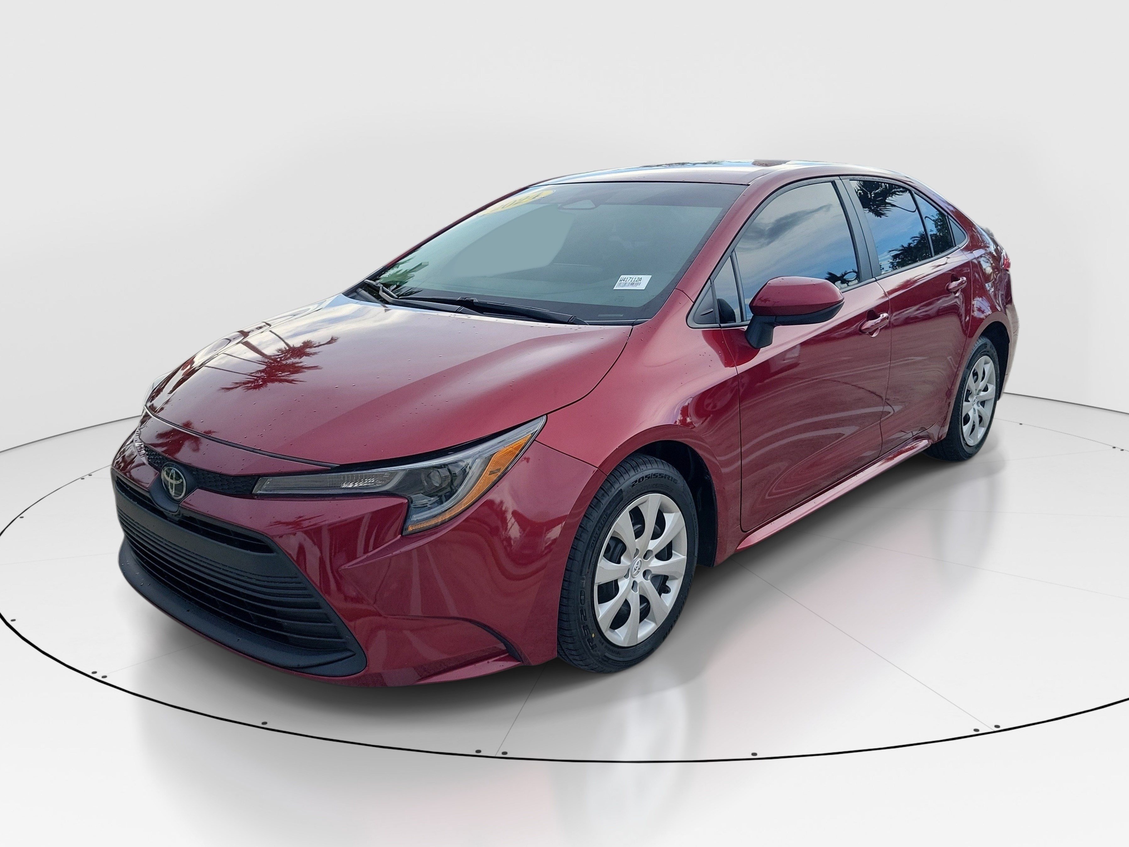 Used 2024 Ruby Flare Pearl/Midnight Black Metallic Toyota LE image 3