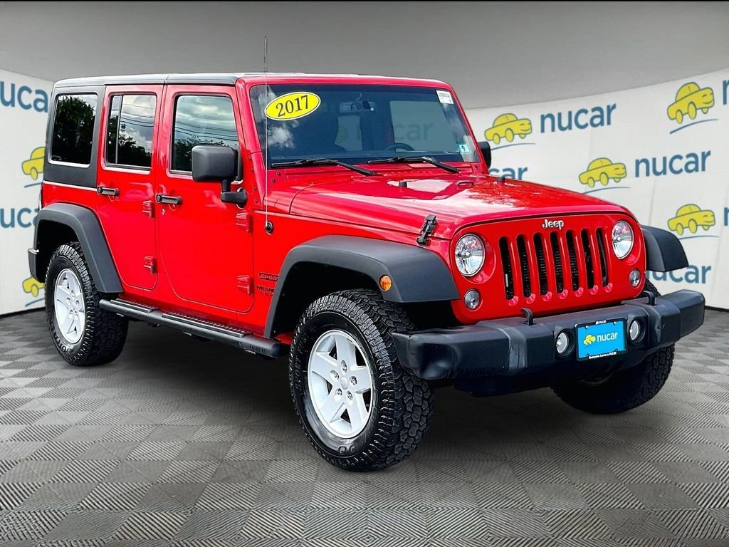 Used 2017 Red Jeep Unlimited Sport image 1