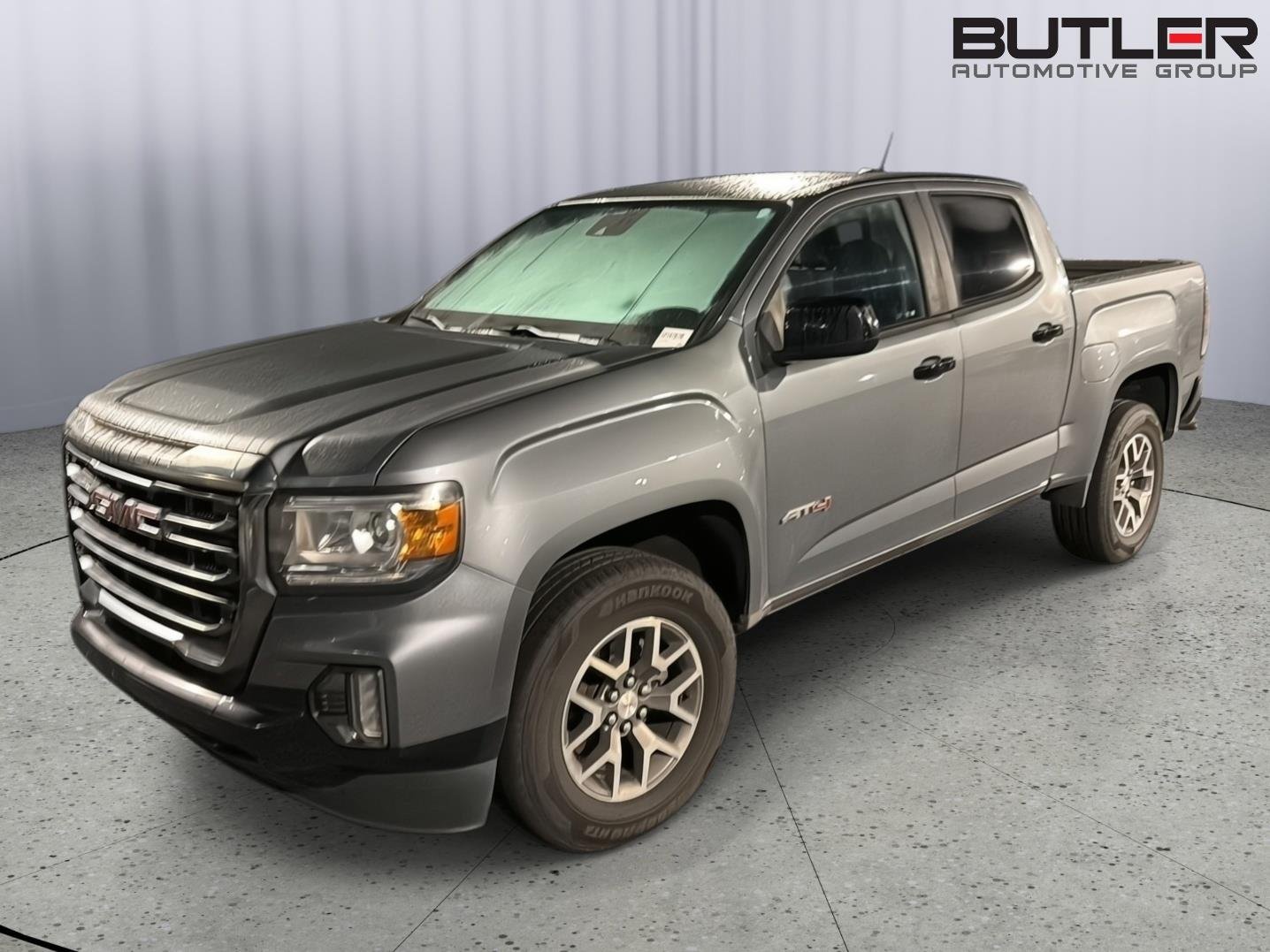 Used 2021 Satin Steel Metallic GMC 4WD AT4 w/Leather image 1