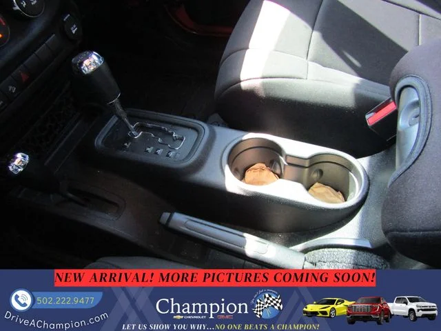 Used 2015 Orange Jeep Unlimited Sport image 16