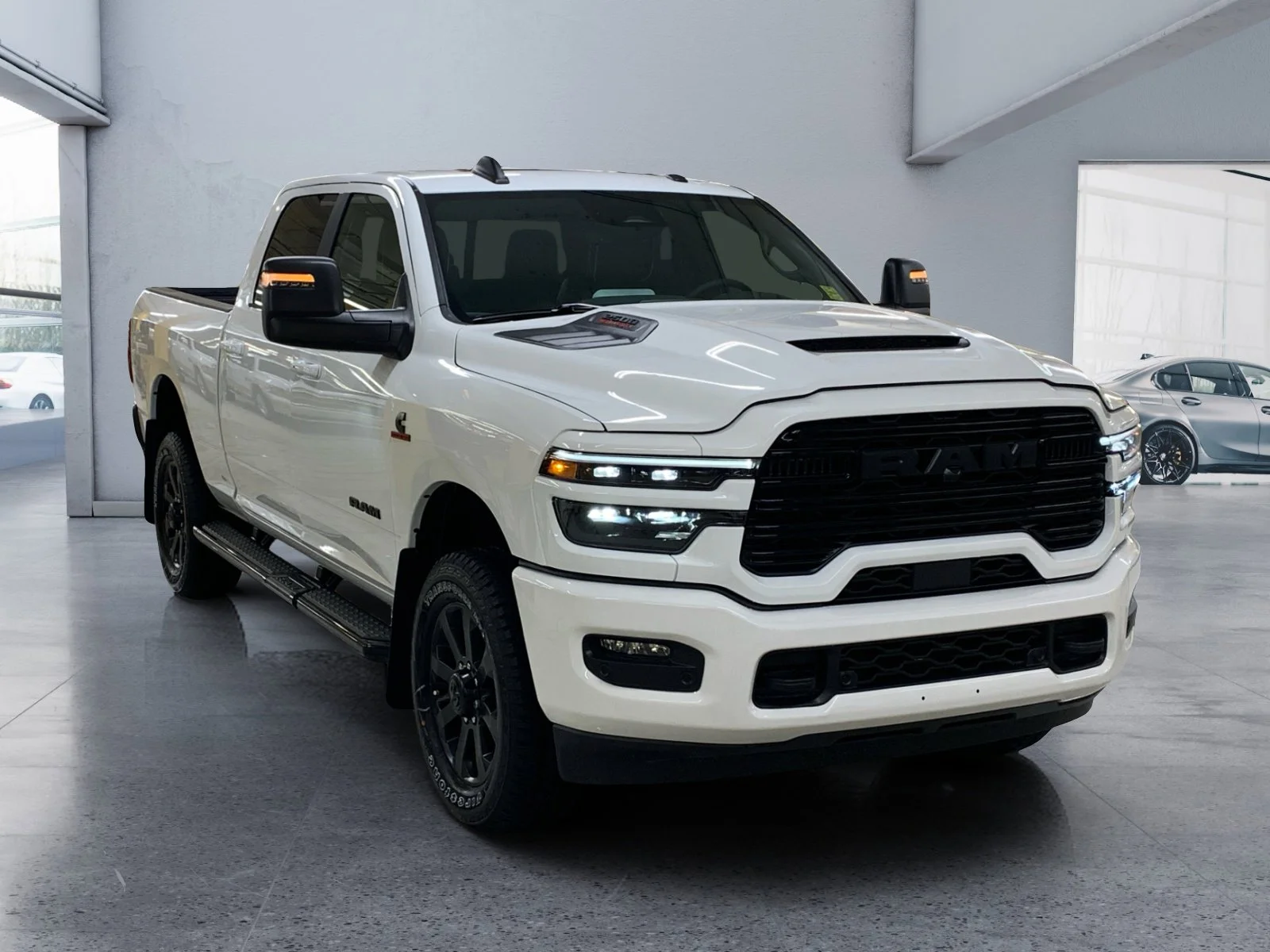 New 2026 Bright White Ram Laramie image 7