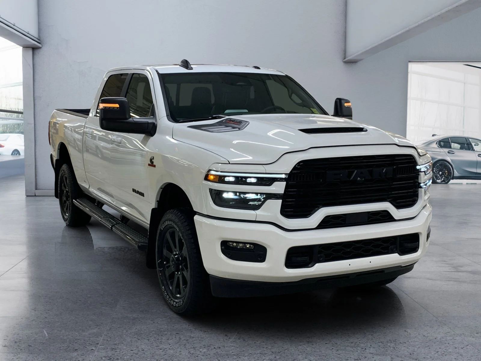 New 2026 Bright White Ram Laramie image 7
