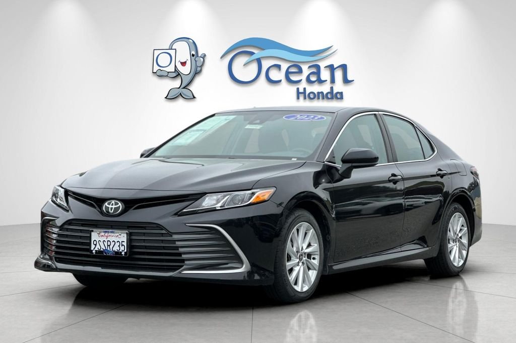 Used 2023 Midnight Black Metallic Toyota LE image 9