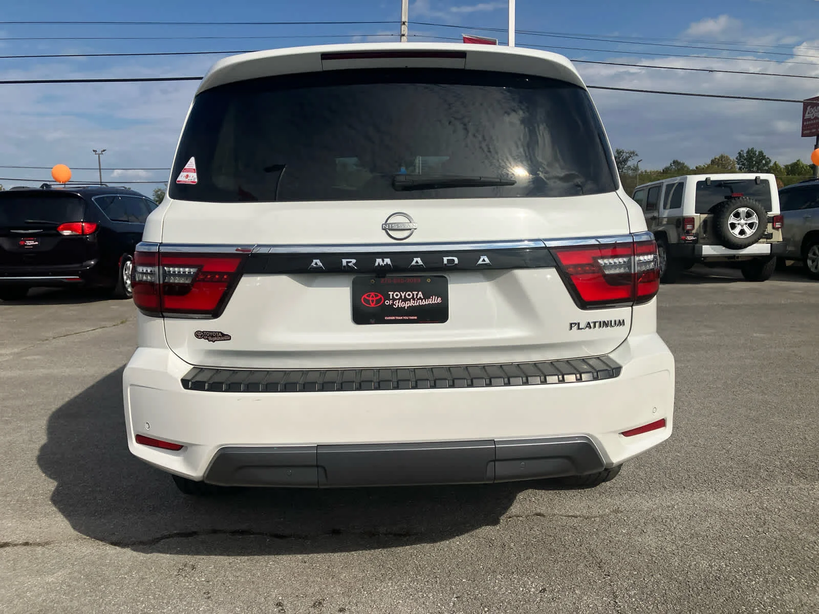 Used 2024 Aspen White Tricoat Nissan Platinum image 6